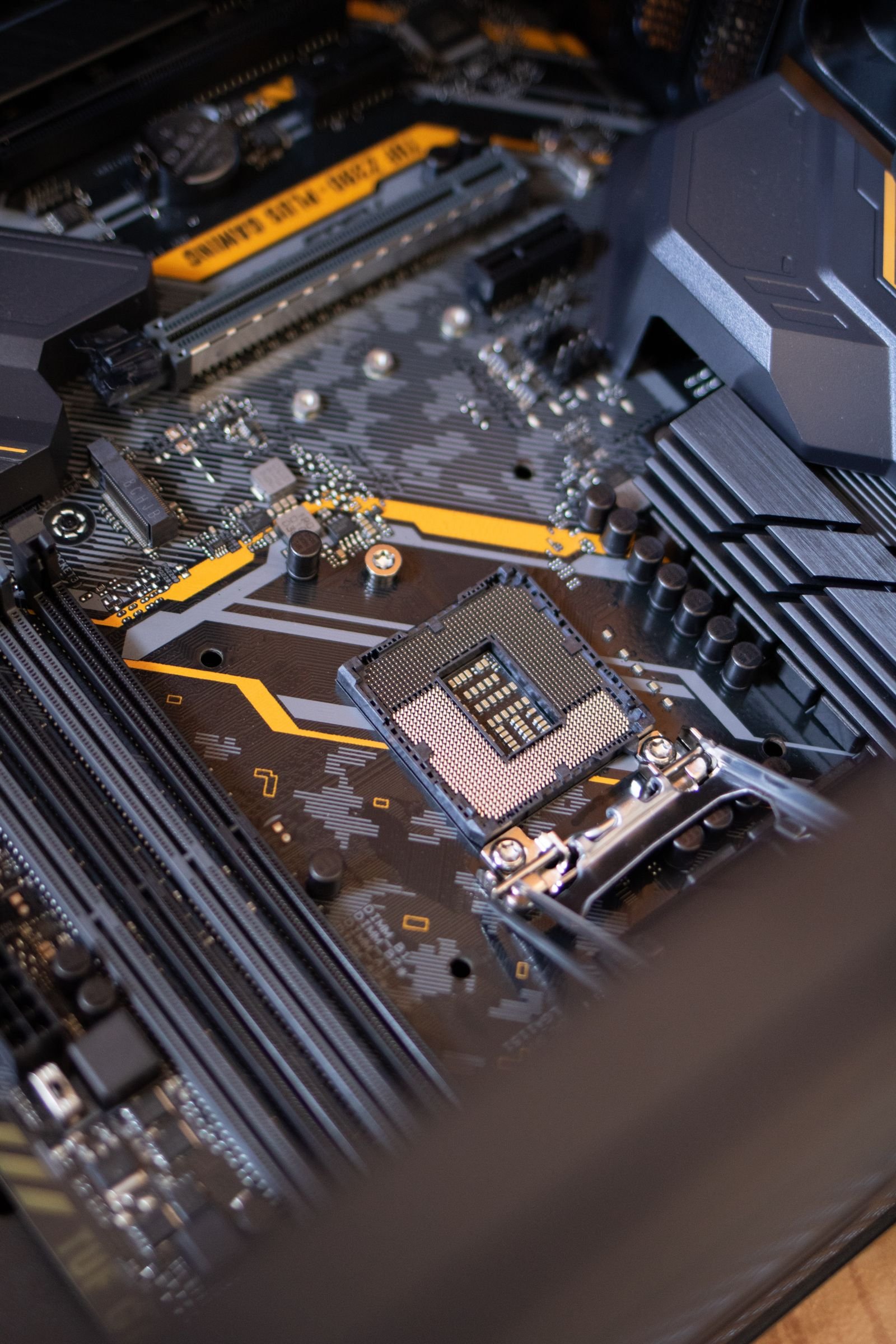 Open processor socket on a computer motherboard, showing the contact field at close range